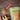 Full Leaf Tea Co. Organic Lung Health Tea pouch with loose herbal blend and wooden tea spoon beside fresh ginger on a wooden surface.