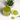 A glass of vibrant green Organic Green Energy Tea on a marble surface, with a bowl and spoon of powdered green tea beside it.