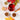 Spiced tea with autumn leaves and spices on a white surface