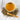 Tea cup with thyroid health tea and a wooden spoon on a light wooden surface