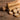 Close up photo of burdock root on a wooden surface. 