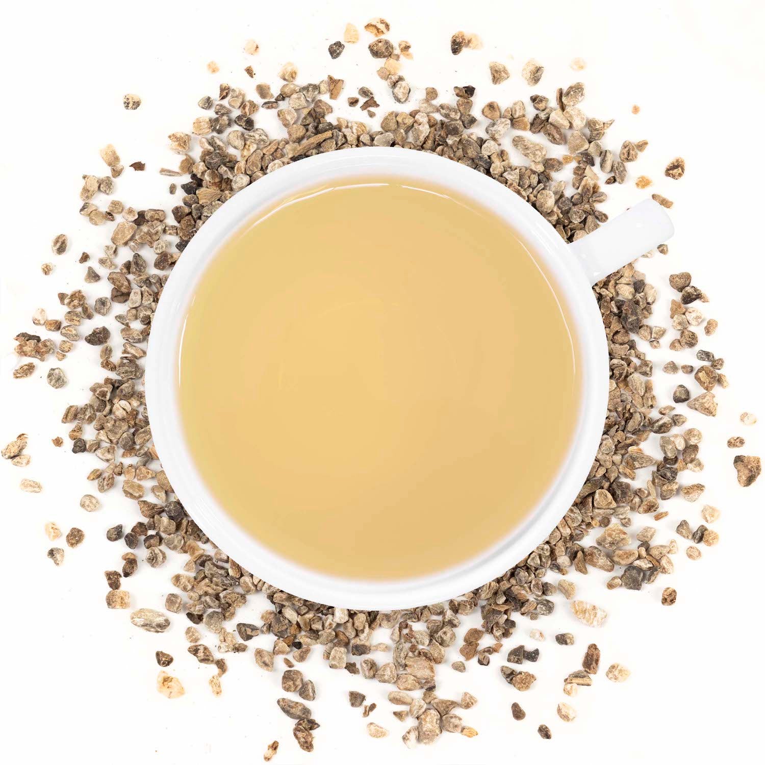 A white cup of Organic Devil's Claw tea surrounded with the ingredient.